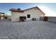 Spacious backyard with minimal landscaping featuring a storage area, for easy maintenance at 4511 S 181St Ave, Goodyear, AZ 85338