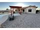 Outdoor backyard with a pergola and gravel landscaping, great for low maintenance at 4511 S 181St Ave, Goodyear, AZ 85338