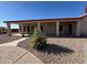 Charming back patio and desert landscaping complement this single-Gathering home at 4511 S 181St Ave, Goodyear, AZ 85338