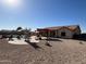 Backyard view with pool and slide, pergola, and low maintenance gravel landscaping at 4511 S 181St Ave, Goodyear, AZ 85338