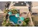 Aerial view showcasing the backyard's sparkling pool, hot tub, and patio, perfect for outdoor enjoyment at 4521 W Maggie Dr, San Tan Valley, AZ 85144