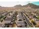 Beautiful aerial view of a suburban neighborhood with mountain views and well-maintained homes at 4521 W Maggie Dr, San Tan Valley, AZ 85144