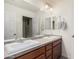 Bathroom featuring double sinks and a separate toilet area at 4521 W Maggie Dr, San Tan Valley, AZ 85144