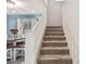 Carpeted staircase leading to the upper level, adjacent to the living and dining areas at 4521 W Maggie Dr, San Tan Valley, AZ 85144