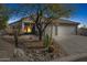 Charming desert home with a low-maintenance yard, mature trees and spacious three-car garage at 4665 S Palacio Way, Gold Canyon, AZ 85118