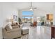 Inviting living room featuring high ceilings, a large window, and access to the outdoor patio at 4665 S Palacio Way, Gold Canyon, AZ 85118