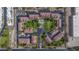 Aerial view of community highlighting the pool, green spaces, and parking areas at 4901 S Calle Los Cerros Dr # 264, Tempe, AZ 85282