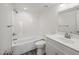 Bathroom with white subway tile shower-tub, white vanity, and updated fixtures at 4901 S Calle Los Cerros Dr # 264, Tempe, AZ 85282