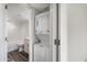 Full bathroom featuring stackable washer-dryer and white subway tile at 4901 S Calle Los Cerros Dr # 264, Tempe, AZ 85282