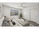 Cozy bedroom featuring sliding door closet and a large window for natural light at 4901 S Calle Los Cerros Dr # 264, Tempe, AZ 85282