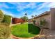 Spacious backyard features lush landscaping and a well-maintained lawn, perfect for outdoor enjoyment at 5024 E Le Marche Ave, Scottsdale, AZ 85254