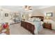 Spacious bedroom features a ceiling fan, nightstands, and a large mirror closet at 5024 E Le Marche Ave, Scottsdale, AZ 85254