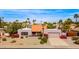 Aerial view of a lovely one-story home with a red tile roof and well-maintained desert landscaping at 5024 E Le Marche Ave, Scottsdale, AZ 85254