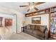 Comfortable living room with hardwood style floors, and a view of the entryway at 5024 E Le Marche Ave, Scottsdale, AZ 85254