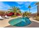 Backyard offers a gorgeous private pool area with tropical landscaping providing a relaxing escape at 5024 E Le Marche Ave, Scottsdale, AZ 85254