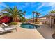 Backyard offers a gorgeous private pool area with tropical landscaping providing a relaxing escape at 5024 E Le Marche Ave, Scottsdale, AZ 85254