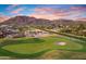 Green golf course with mountain views at 5567 E Mcdonald Dr, Paradise Valley, AZ 85253