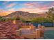 Rooftop deck with mountain views at sunset at 5567 E Mcdonald Dr, Paradise Valley, AZ 85253