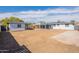 Spacious backyard featuring patio area, storage, and plenty of room to customize at 5731 W Morten Ave, Glendale, AZ 85301