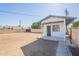 View of the property from the backyard showing the patio and additional structure at 5731 W Morten Ave, Glendale, AZ 85301