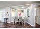 Bright dining area featuring a charming bay window and a sleek, modern table setting at 6177 S Sawgrass Dr, Chandler, AZ 85249