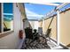 Welcoming patio with dining set, overhead string lights, and privacy screens for a cozy outdoor living space at 6177 S Sawgrass Dr, Chandler, AZ 85249