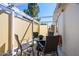 Cozy covered patio with an outdoor dining set and decorative rug, perfect for relaxing or entertaining at 6177 S Sawgrass Dr, Chandler, AZ 85249