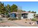 Exterior view of a charming post office building surrounded by desert landscaping and blue sky at 6177 S Sawgrass Dr, Chandler, AZ 85249