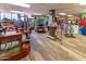 The inside of a golf shop with clothing and accessories at 6177 S Sawgrass Dr, Chandler, AZ 85249