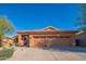 Lovely single story home with a three car garage and low maintenance desert landscaping at 7138 W Buckskin Trl, Peoria, AZ 85383