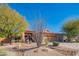 Charming desert home with low maintenance landscaping and a three car garage at 7138 W Buckskin Trl, Peoria, AZ 85383