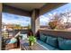 Inviting patio area with comfortable seating, a table, and a peaceful view of the surrounding community at 7401 W Arrowhead Clubhouse Dr # 2079, Glendale, AZ 85308