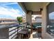 Relaxing outdoor patio with seating, a bar area, and views of the neighborhood for comfortable outdoor living at 7401 W Arrowhead Clubhouse Dr # 2079, Glendale, AZ 85308