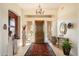 A grand foyer with high ceilings and a decorative chandelier at 7848 E Parkview Ln, Scottsdale, AZ 85255