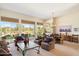 A well-lit living room with a view of the back yard at 7848 E Parkview Ln, Scottsdale, AZ 85255