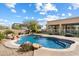 Sparkling pool with rock accents in private fenced-in backyard at 7848 E Parkview Ln, Scottsdale, AZ 85255