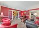 Bright living room with large doorway, carpet flooring, and decorative furnishings at 8230 E Valley Vista Dr, Scottsdale, AZ 85250