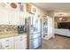 Stainless steel refrigerator and well-appointed kitchen with modern appliances at 8984 E Sutton Dr, Scottsdale, AZ 85260