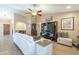 Comfortable living room with a ceiling fan, stylish furniture, and neutral tones at 8984 E Sutton Dr, Scottsdale, AZ 85260