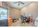 Home office space with natural light, desk, and ample storage at 8984 E Sutton Dr, Scottsdale, AZ 85260