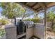 Outdoor kitchen area with a built-in grill, perfect for backyard entertaining at 8984 E Sutton Dr, Scottsdale, AZ 85260