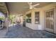 Covered patio with outdoor kitchen and dining area, perfect for relaxing outdoors at 8984 E Sutton Dr, Scottsdale, AZ 85260