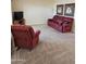 Cozy living room with plush carpeting and comfortable seating, perfect for relaxation at 904 Leisure World --, Mesa, AZ 85206