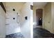 Walk-in shower with natural stone accents and modern fixtures at 9576 E Kiisa Dr, Scottsdale, AZ 85262