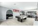 Open floor plan featuring a game room with a pool table, adjacent to the kitchen and a cozy seating area at 10008 N 50Th Dr, Glendale, AZ 85302