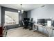 Inviting home office with neutral walls, natural light and sleek flooring at 10008 N 50Th Dr, Glendale, AZ 85302