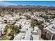 Expansive aerial shot of a community featuring well-maintained residences and desert landscaping at 11333 N 92Nd St # 2072, Scottsdale, AZ 85260