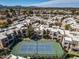 Aerial view of the community featuring residences and a well-maintained tennis court at 11333 N 92Nd St # 2072, Scottsdale, AZ 85260