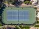 Overhead view of a tennis court surrounded by mature trees and shrubs at 11333 N 92Nd St # 2072, Scottsdale, AZ 85260