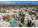 Beautiful aerial view of complex featuring swimming pool, palm trees, and mountain views at 11333 N 92Nd St # 2072, Scottsdale, AZ 85260